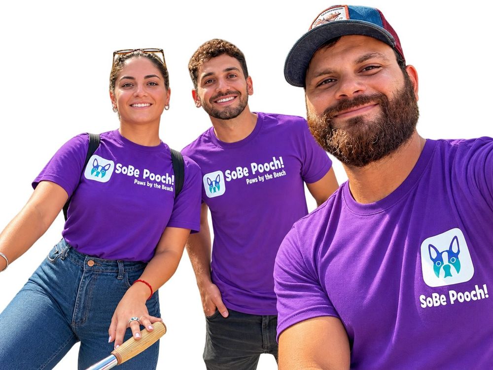 The SoBe Pooch team in purple SoBe Pooch shirts